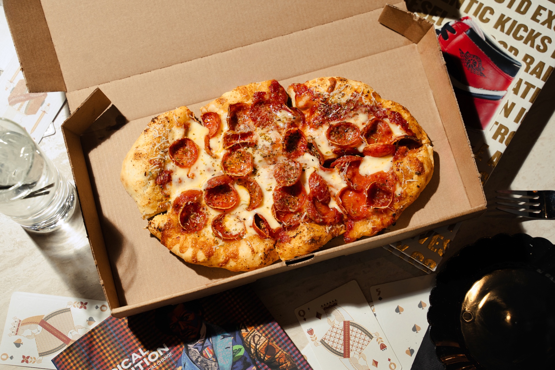 Pepperoni Pop Off: house cheese blend, house red sauce, loads of pepperoni cups